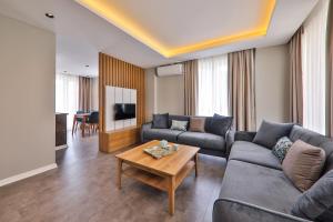 A television and/or entertainment centre at Duygu Apart