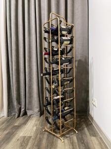 a wine rack filled with lots of wine glasses at CITY VIEW PENTHOUSE in Yerevan
