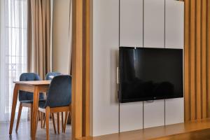 A television and/or entertainment centre at Duygu Apart