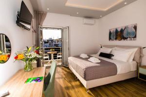 A bed or beds in a room at Chrysi's Ocean View Retreat