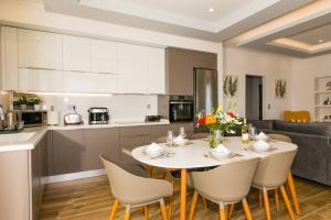 A kitchen or kitchenette at Chrysi's Ocean View Retreat