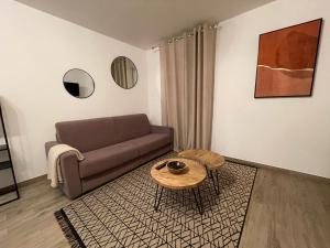 Ein Sitzbereich in der Unterkunft Residence Des Îles