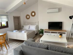 Кровать или кровати в номере City Suites