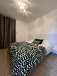 Ein Bett oder Betten in einem Zimmer der Unterkunft Residence Des Îles