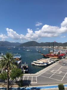 a marina with boats parked in the water at Trea Homes Marina Suites in Marmaris