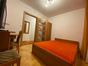 Posteľ alebo postele v izbe v ubytovaní 2-pokojowe Apartamenty KAMIL Krynica-Zdrój