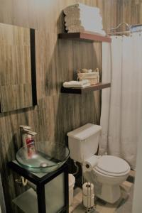Koupelna v ubytování Casa Raquelina, casa habitacional