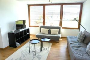 Posezení v ubytování Terrassenwohnung in prämierter Wohnanlage