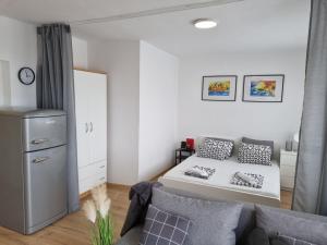 Kuchyňa alebo kuchynka v ubytovaní Apartmani Mali