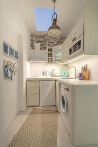 Kuchyňa alebo kuchynka v ubytovaní Lasia Boutique Apartment