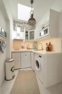 Kuchyňa alebo kuchynka v ubytovaní Lasia Boutique Apartment