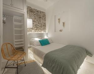 Posteľ alebo postele v izbe v ubytovaní Lasia Boutique Apartment