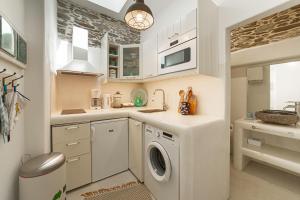 Kuchyňa alebo kuchynka v ubytovaní Lasia Boutique Apartment