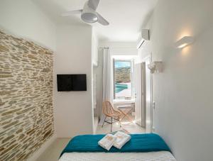 A bed or beds in a room at Lasia Boutique Apartment