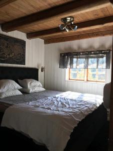 Postel nebo postele na pokoji v ubytování Näkna Hill