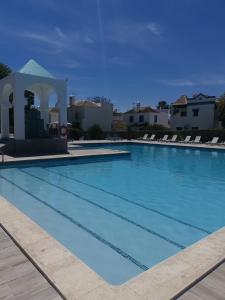 Der Swimmingpool an oder in der Nähe von Algarent Cabanas de Tavira Quinta Velha Cosy 214