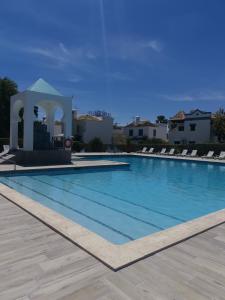 สระว่ายน้ำที่อยู่ใกล้ ๆ หรือใน Quinta Velha Cabanas de Tavira Jolie 208 by Algarent