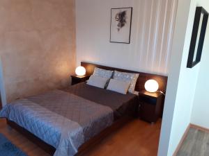 Łóżko lub łóżka w pokoju w obiekcie GRAND VILLA USTKA- Marmonoli