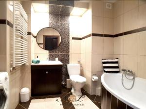Kúpeľňa v ubytovaní Apartament Peowiaków Superior + 28 fotografií