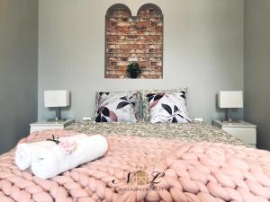 Posteľ alebo postele v izbe v ubytovaní Apartament Peowiaków Superior