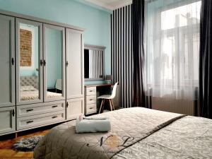 Posteľ alebo postele v izbe v ubytovaní Apartament Peowiaków Superior