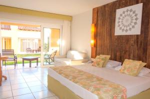 Ліжко або ліжка в номері Búzios Beach Resort