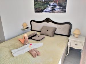 Una cama o camas en una habitación de Apartmani Soko Day 1