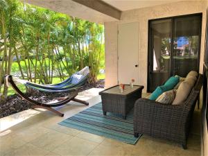 Zona d'estar a Coconut at Shores - Waikoloa Beach Resort