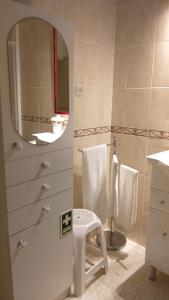 Koupelna v ubytování Center Beach Apartment + 24 fotografií