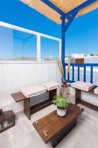 Ένα ή περισσότερα κρεβάτια σε δωμάτιο στο Whitelist Loft in Mykonos Town