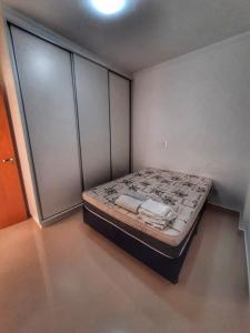 BALI - PAZ & CONFORTO COM WIFI e VAGA,Máx4 pessoas客房内的一张或多张床位