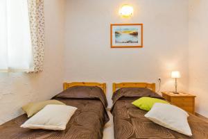 Posteľ alebo postele v izbe v ubytovaní Villa Dubrovnik Chalets