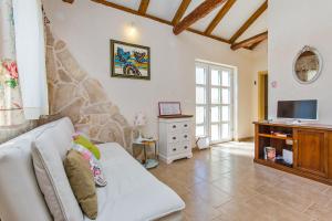 Televízia a/alebo spoločenská miestnosť v ubytovaní Villa Dubrovnik Chalets