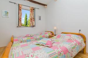 Posteľ alebo postele v izbe v ubytovaní Villa Dubrovnik Chalets