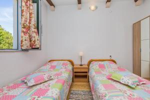 Posteľ alebo postele v izbe v ubytovaní Villa Dubrovnik Chalets
