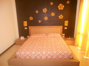 En eller flere senge i et værelse på B&B Verdeblu