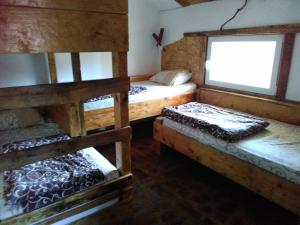 Postel nebo postele na pokoji v ubytování Apartmani Pinkum