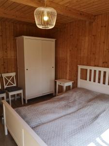 Posteľ alebo postele v izbe v ubytovaní Rytebłota Resort & Spa