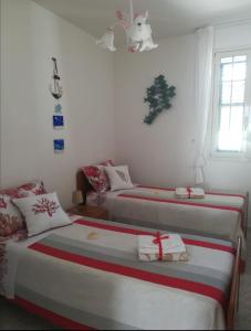 Postel nebo postele na pokoji v ubytování Casa Rosa