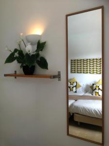 A bed or beds in a room at Casa Amelia