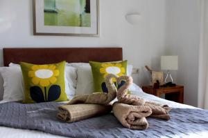 A bed or beds in a room at Casa Amelia