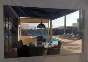 The swimming pool at or close to Casa Amelia