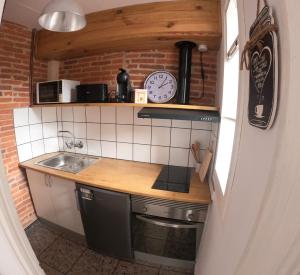 Kuchyň nebo kuchyňský kout v ubytování Casa Olivera- apartament al Passeig Font Vella