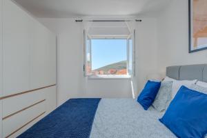 Postel nebo postele na pokoji v ubytování Apartman Bonaca