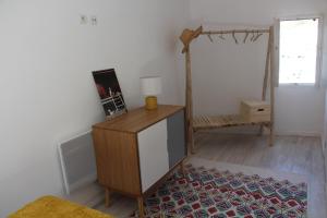 Postel nebo postele na pokoji v ubytování Charmant Cabanon aux Goudes à Marseille avec vue mer