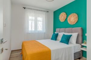 Postel nebo postele na pokoji v ubytování Apartman Bonaca