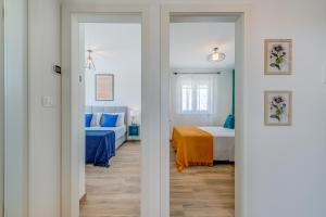 Postel nebo postele na pokoji v ubytování Apartman Bonaca