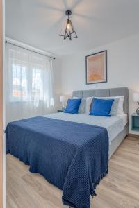 Postel nebo postele na pokoji v ubytování Apartman Bonaca