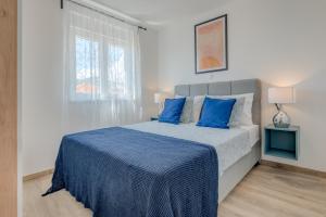 Postel nebo postele na pokoji v ubytování Apartman Bonaca