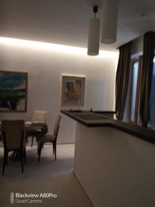 Posedenie v ubytovaní Dimora50 Apartament